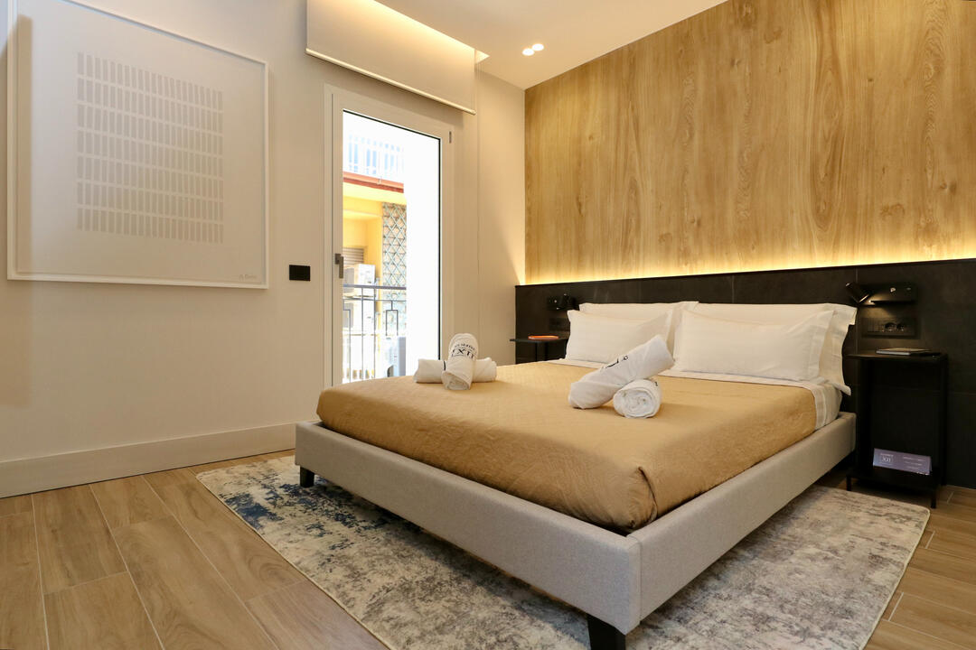 Spacious bedroom with king-sized bed Spacious bedroom with king-sized bed