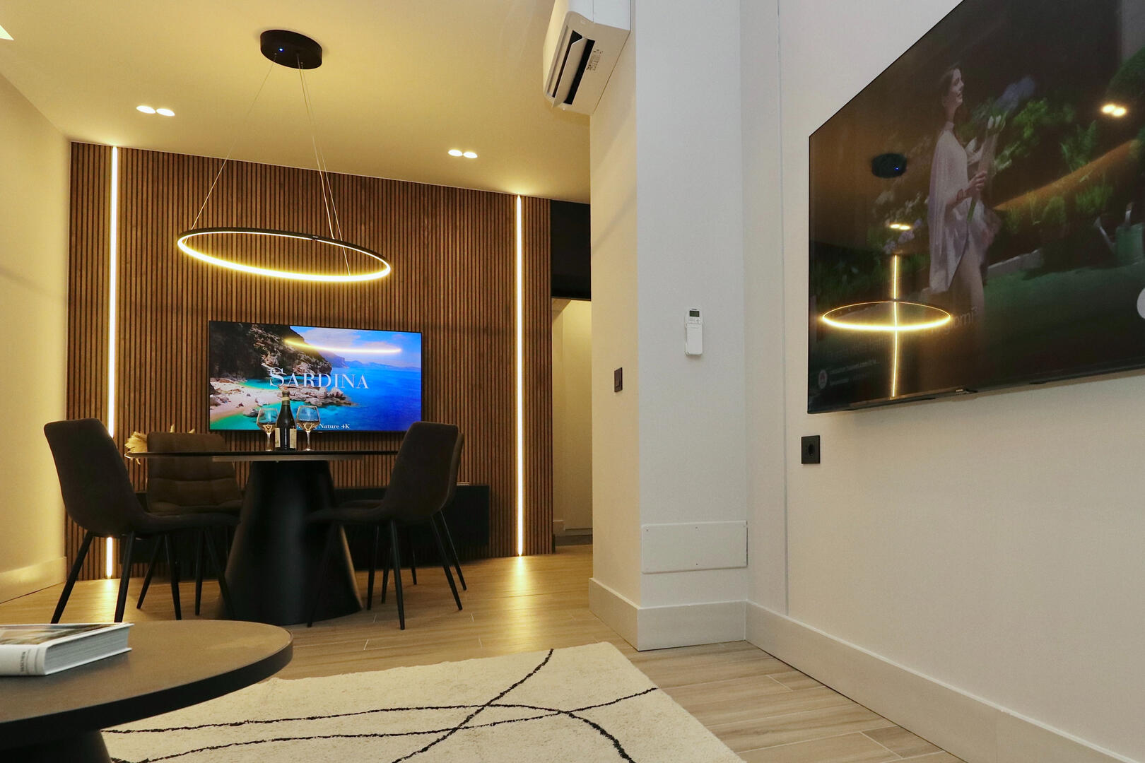 Two large smart TV's in the Living and Dining Area